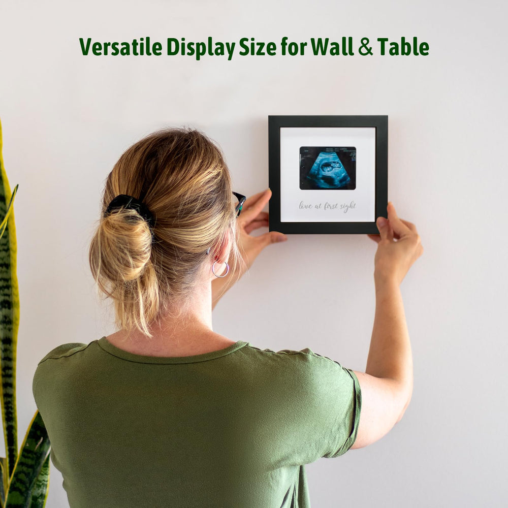 HAMUIERS Love at First Sight frame with plexiglass cover protects photos safely.