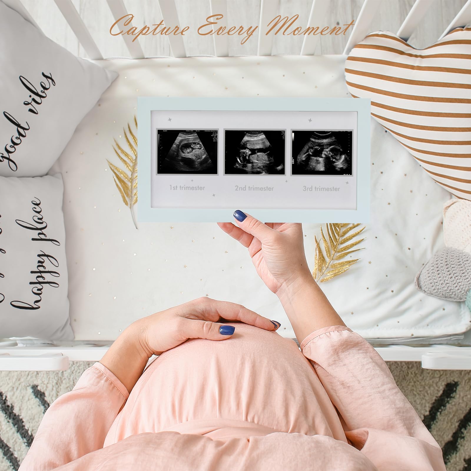 HAMUIERS Ultrasound Frame wall-mount option blending with modern baby decor.
