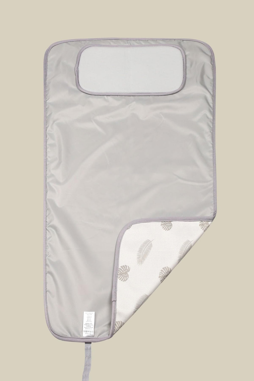 Hamur Home headrest padding provides gentle support for baby during changes.
