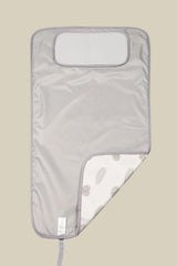 Hamur Home headrest padding provides gentle support for baby during changes.