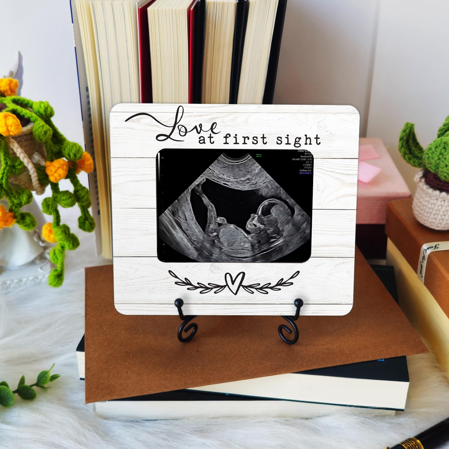 Hangwoous baby sonogram picture frame captures first ultrasound moment.