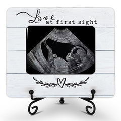 Hangwoous sonogram frame with wooden stand showcases ultrasound memories.