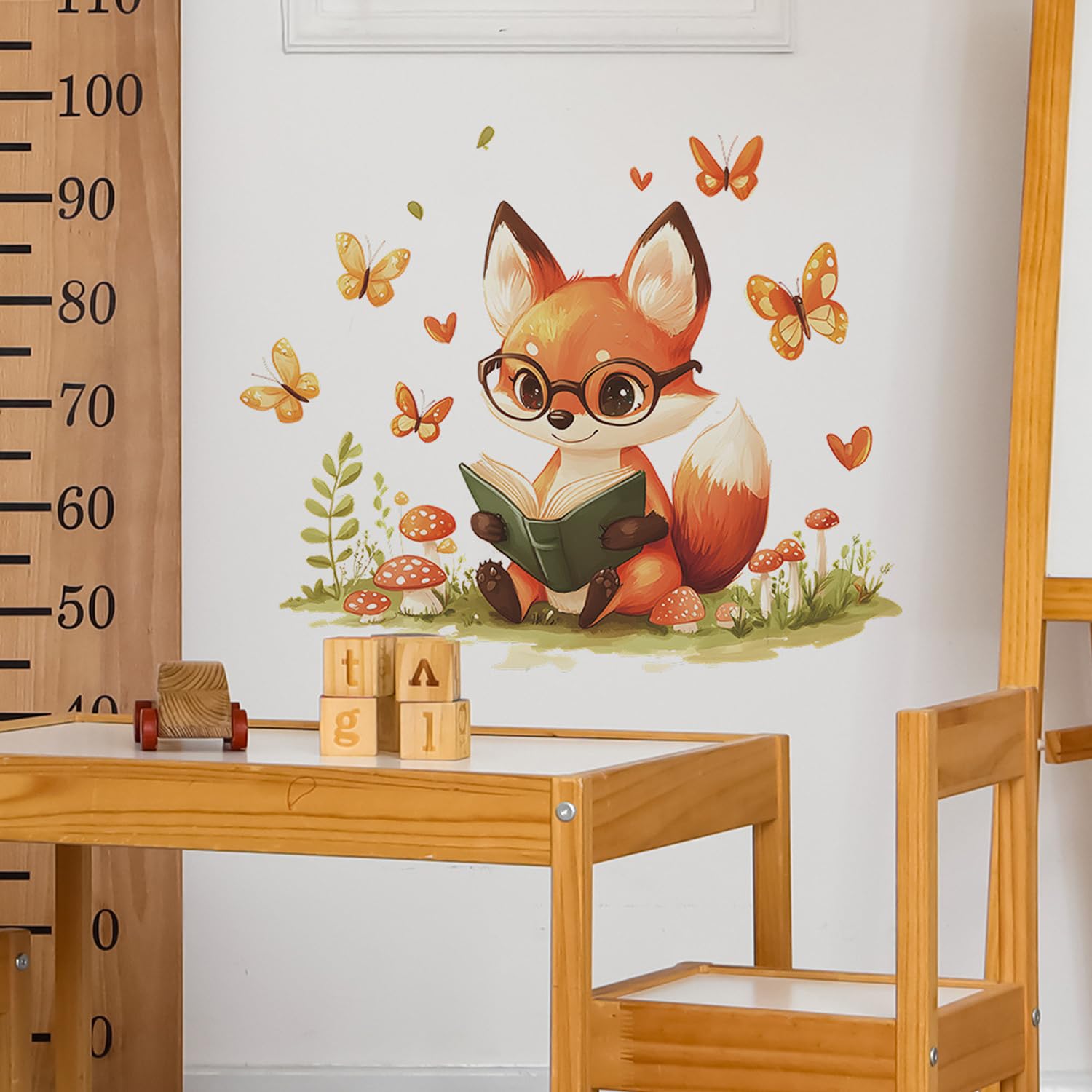 HANOZGU Woodland Fox Reading Wall Decal shows gentle butterflies around the fox.