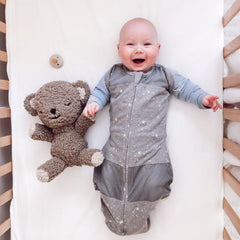 Bottom zipper on Sleepea Ivory Planets allows easy diaper access during night-time care.