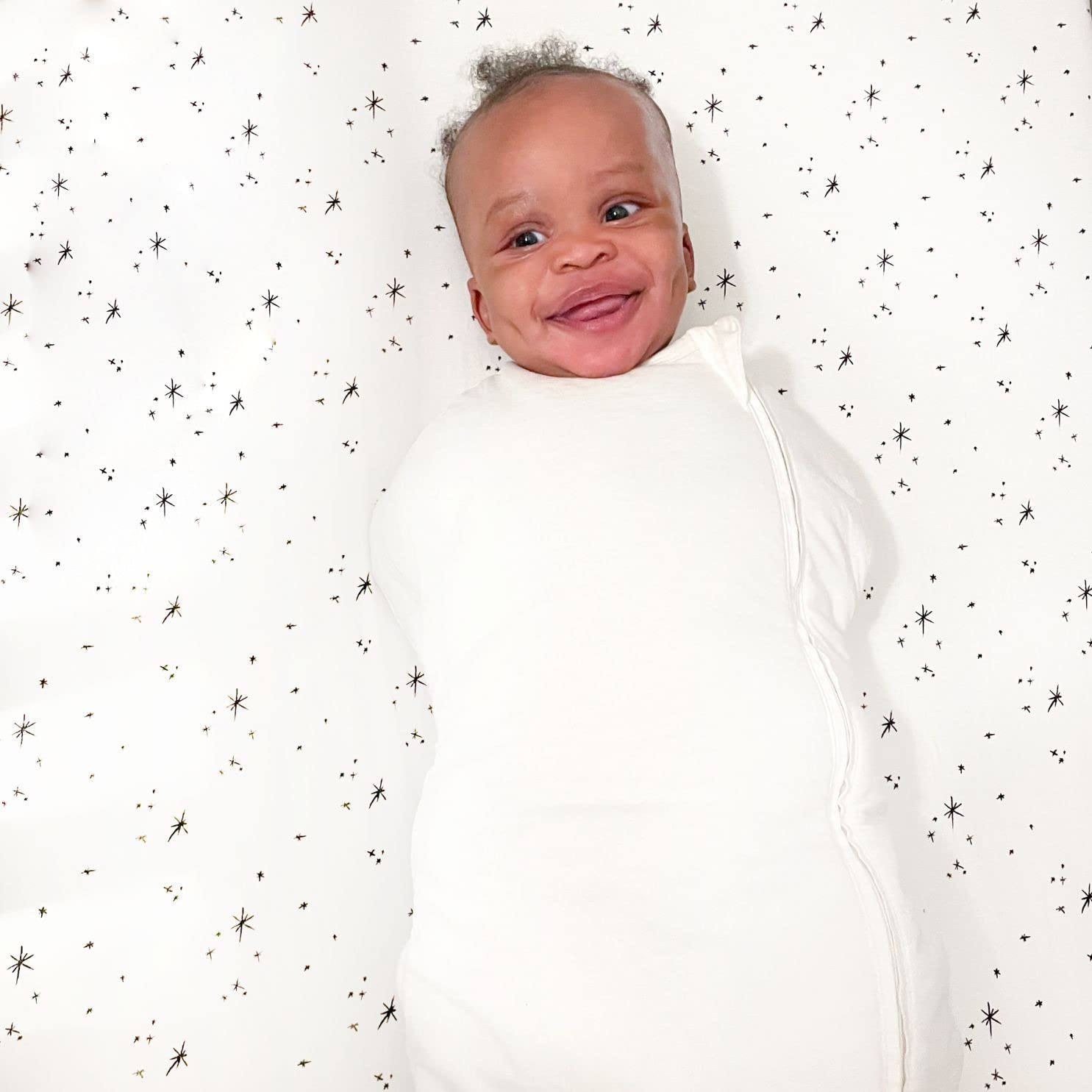 Happiest Baby Sleepea Comforter Swaddle organic shell with 100% organic cotton for gentle skin contact.