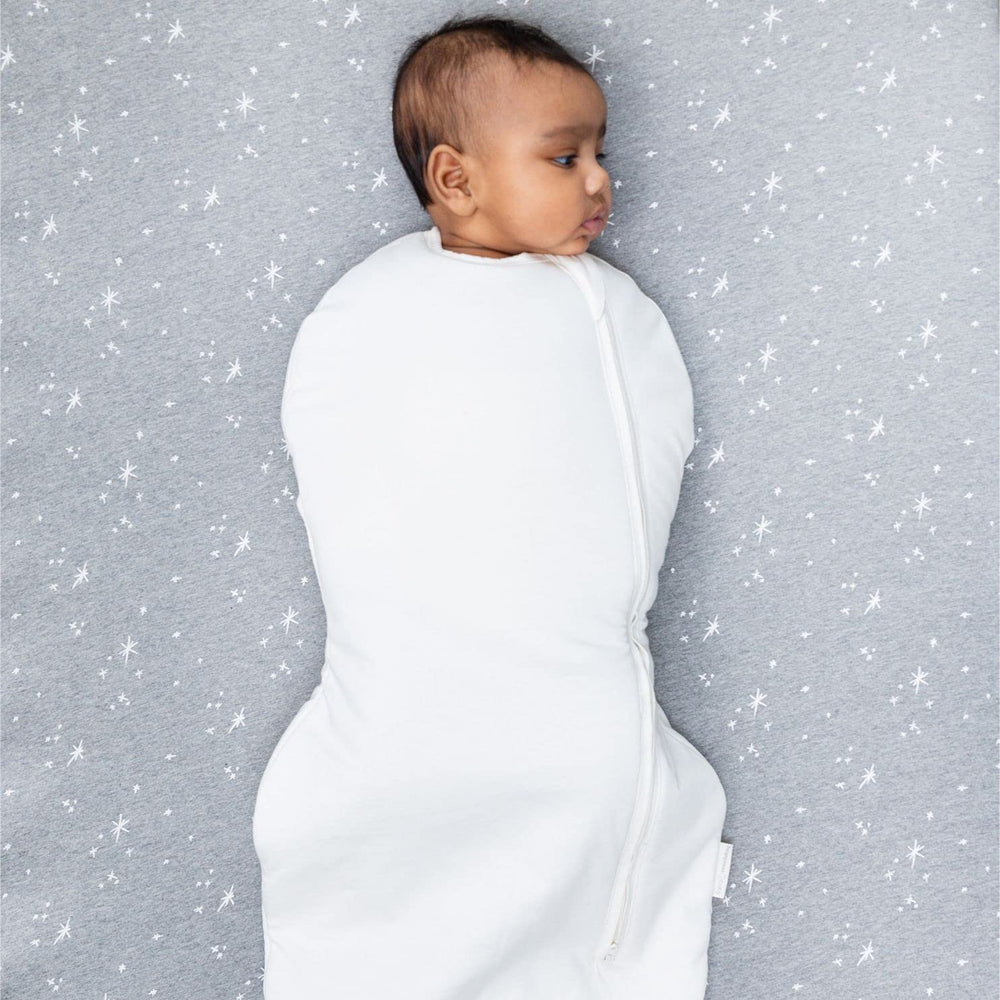 Happiest Baby Sleepea Comforter Swaddle shoulder snaps support arms-out sleep as baby grows.