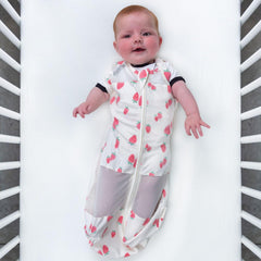 Happiest Baby Sleepea ivory strawberries XL zipper-open demonstrates easy midnight changes.