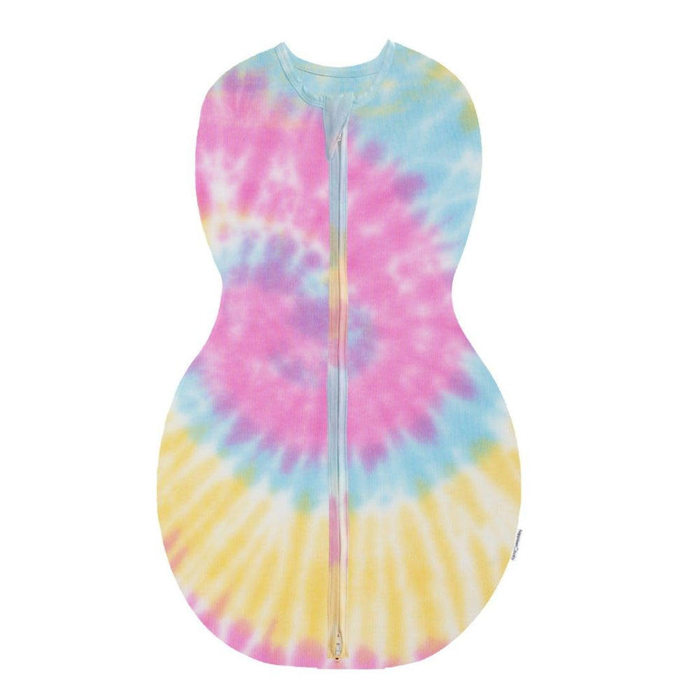 Happiest Baby Sleepea tie-dye rainbow swaddle packaging highlights premium organic cotton.