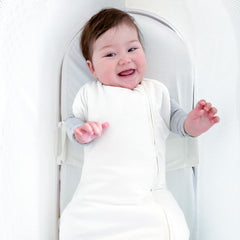 Happiest Baby SNOO Comforter Sack graphite shoulder snaps enable arms-in or arms-out sleep.