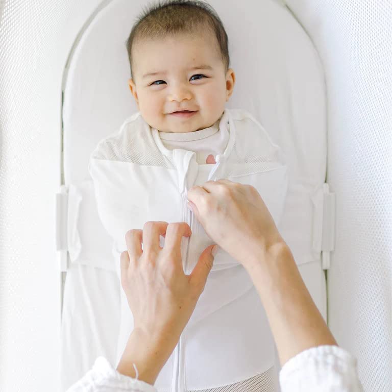 Arms-out mode demonstrated on Happiest Baby SNOO Sleep Sack