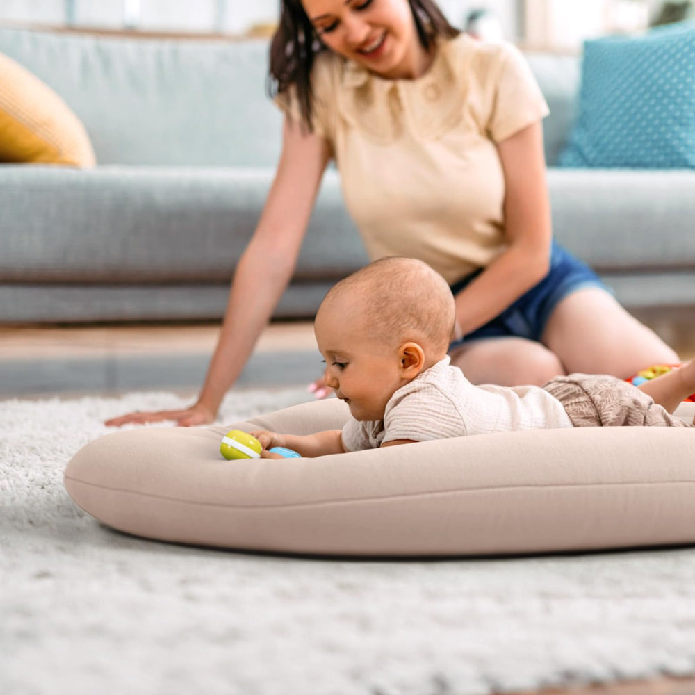 Happle sunny 360-padded sides illustrate secure tummy-time experience during supervised play