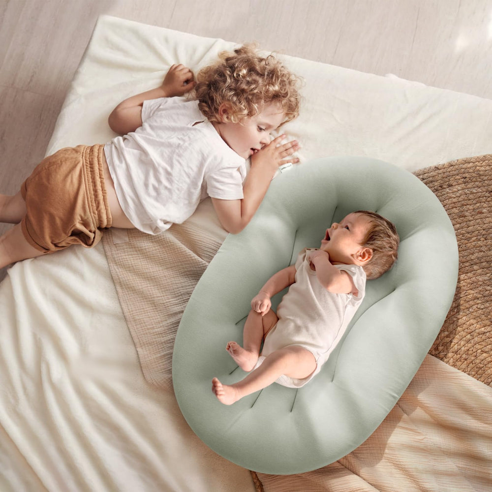 Happle sunny baby lounger offers ergonomic support to help baby's posture during play.
