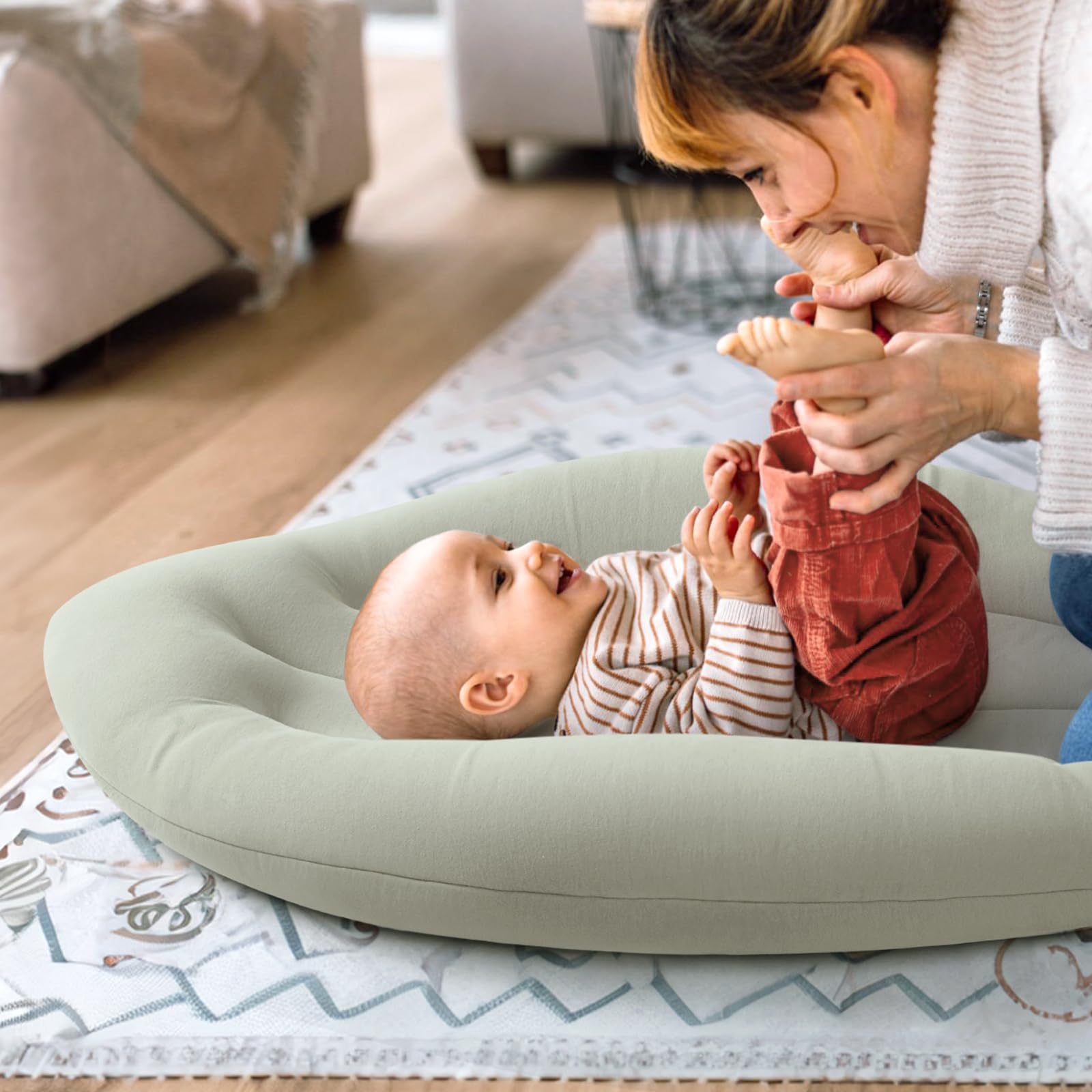 Happle Sunny baby lounger demonstrates ergonomic support with elevated borders
