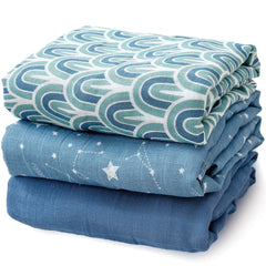 Happy Flute 3-set muslin swaddle blankets blue folded, showcasing compact, portable multi-use baby blankets.