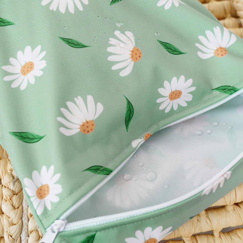 Happy Flute Daisy wet bag multi-use setup for gym, travel, and diaper changes