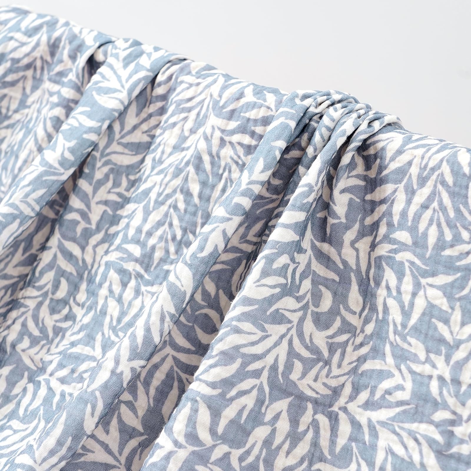 Happy Flute Leaf Design Soft Texture Closeup: plush muslin for tender touch.