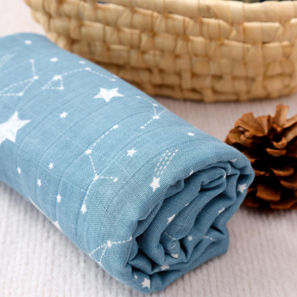 Happy Flute muslin swaddle blanket absorbent burp cloth ready blue, ideal for quick cleanups.