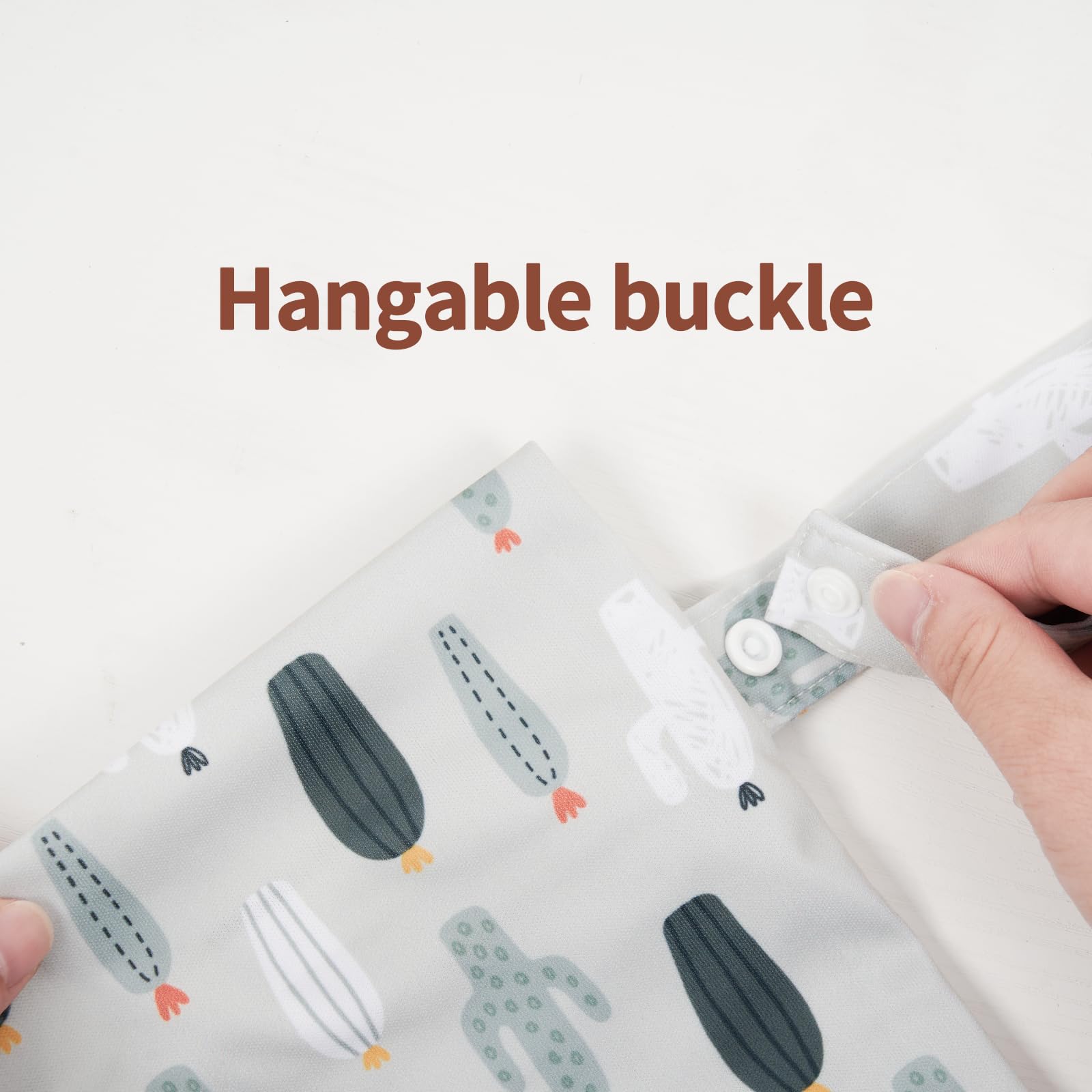 Happy Flute reusable pouch being carried for on-the-go diaper storage