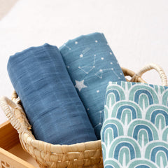Happy Flute swaddle blankets baby swaddled blue, highlighting gentle wrap for comforting soothing sleep time.