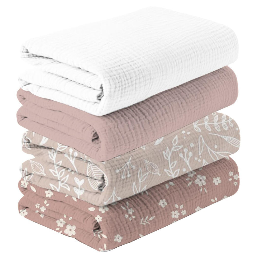 Happy Flute swaddle flower-pattern close-up highlights ultra-soft muslin for newborns.
