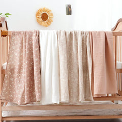 Happy Flute swaddle set demonstrates versatility for nursery and daily use.