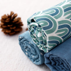 Happy Flute swaddle blankets nursing cover blue, showing versatile cover for breastfeeding moments.
