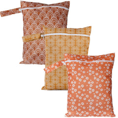 Happy Flute 3-set wet bags on display with travel-ready patterns