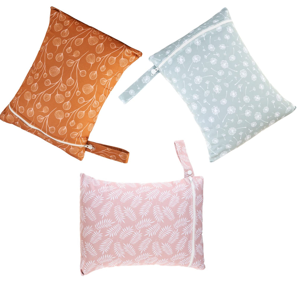 Happy Flute wet bag demonstrates versatile use for beach, travel, and diaper bag needs.