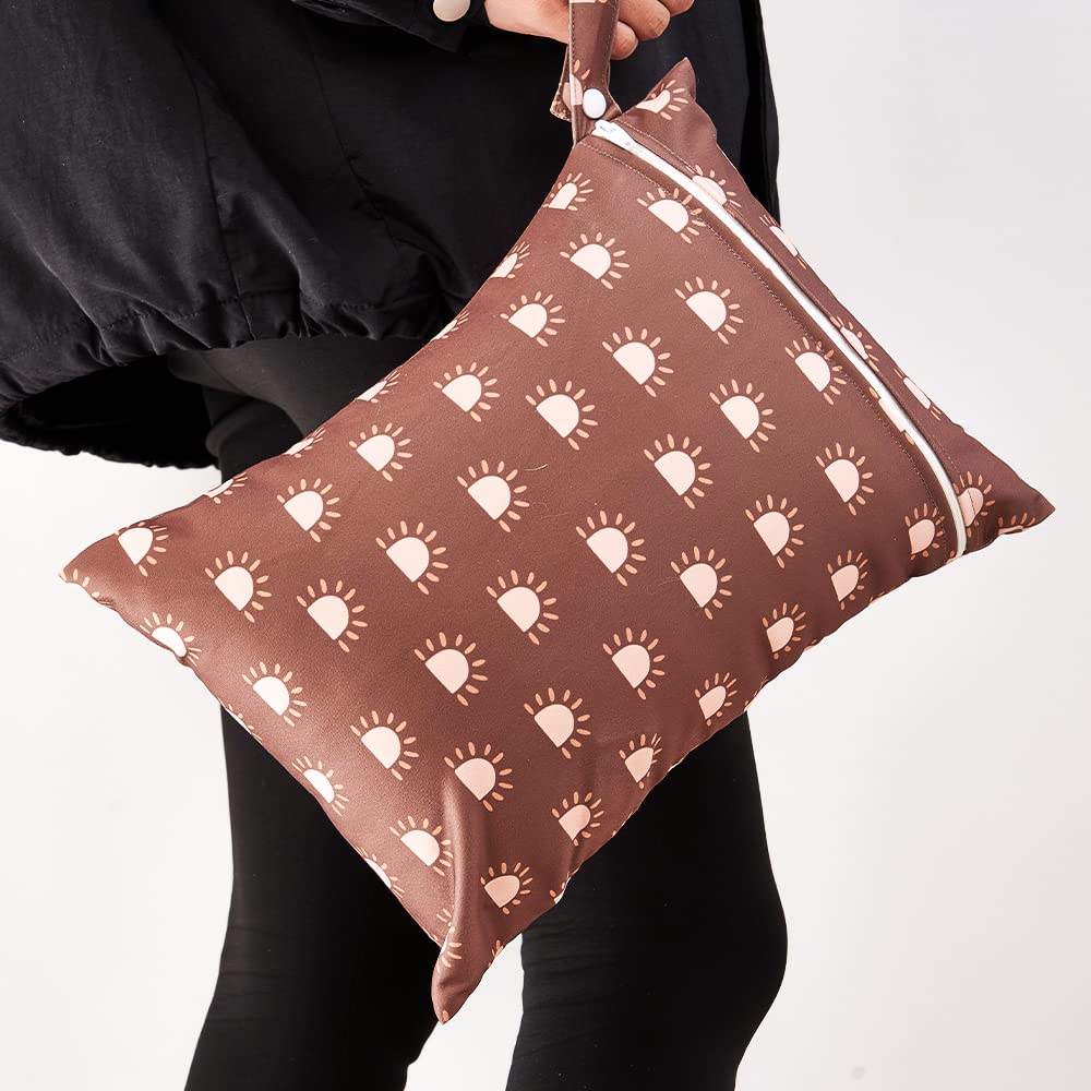 Happy Flute three-set wet bags offer coordinated travel storage for families.
