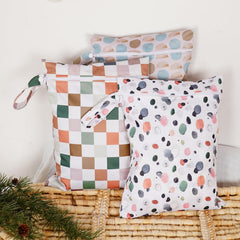 Happy Flute wet bag lattice three-pack demonstrates versatility for travel and family days.