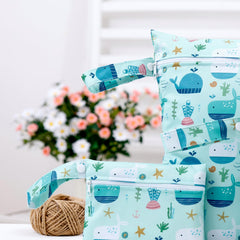 Happy Flute wet bag folds flat for compact packing on trips and weekends away.