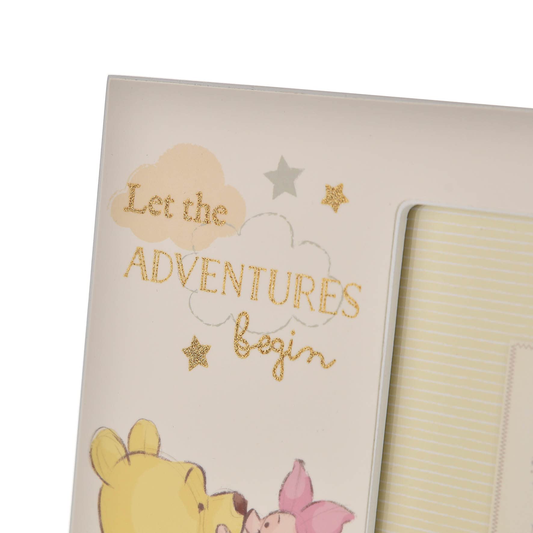Happy Homewares Winnie Pooh photo frame with gold lettering enhances nursery decor.