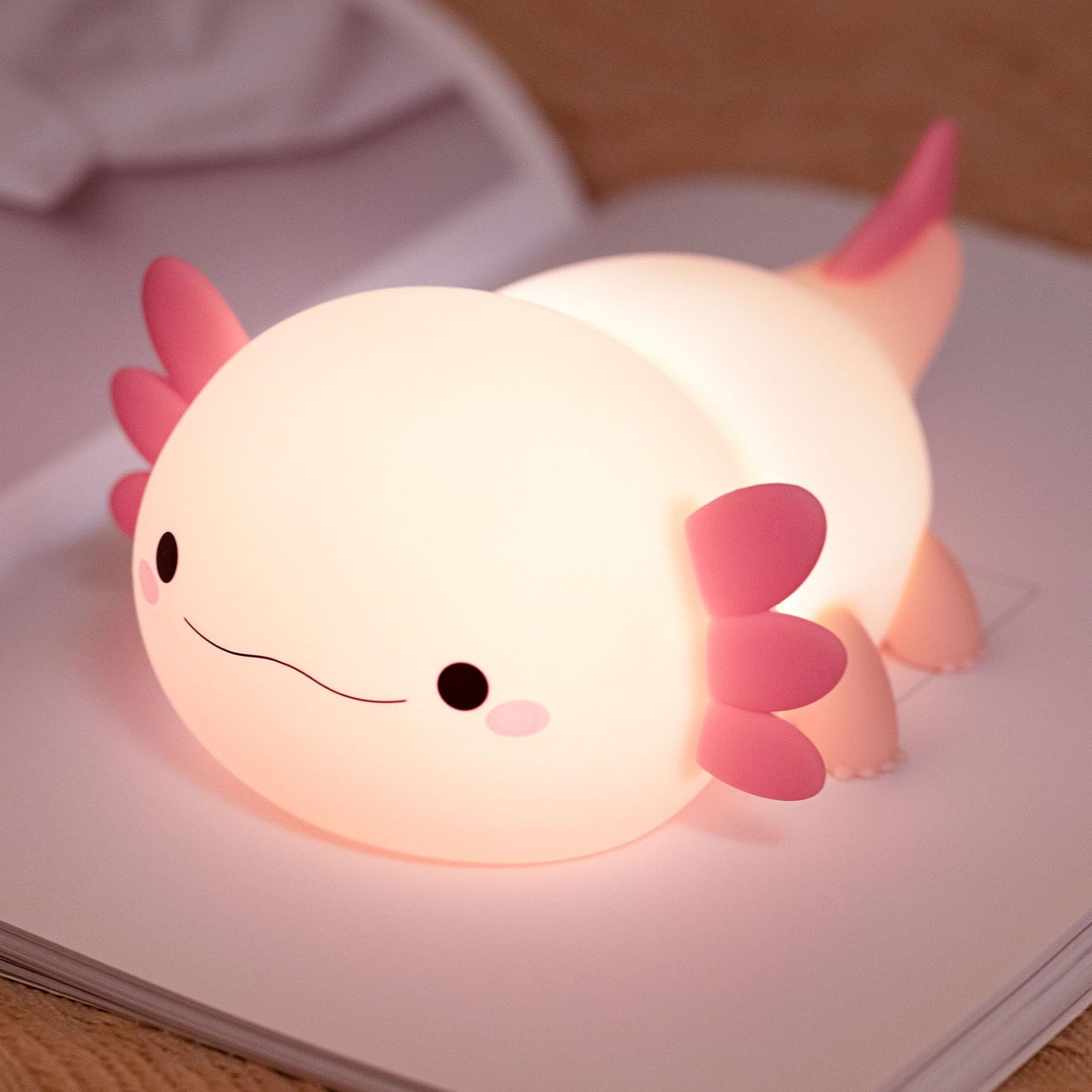 HAPPYBAG Axolotl Night Light glows softly at the bedside for bedtime