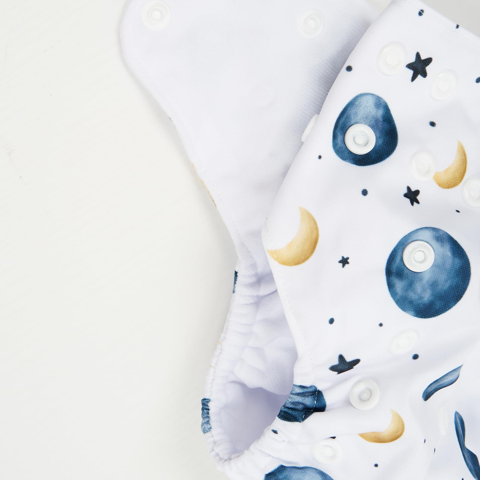 HappyFlute adjustable snug-fit diaper with reinforced legs reduces leaks and keeps baby comfortable.