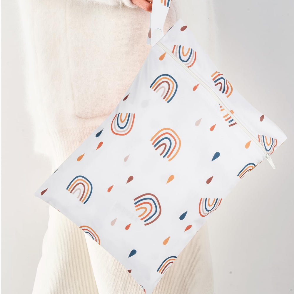 HappyFlute adjustable-fit feature with side tabs demonstrated on a diaper.