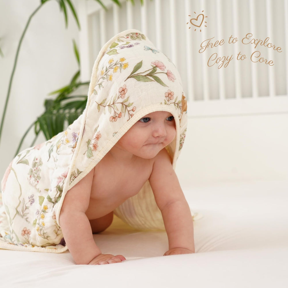 HardNok large 32x32 towels draped on a changing table.
