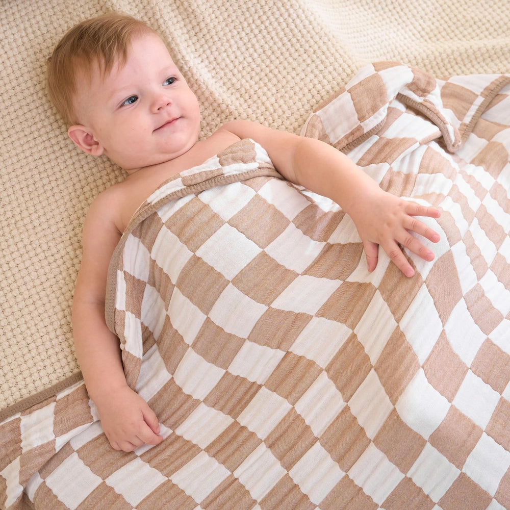 HardNok Ultra Soft Muslin Blanket baby swaddle use demonstrates gentle wrap for comfort.