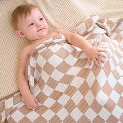 HardNok Ultra Soft Muslin Blanket baby swaddle use demonstrates gentle wrap for comfort.