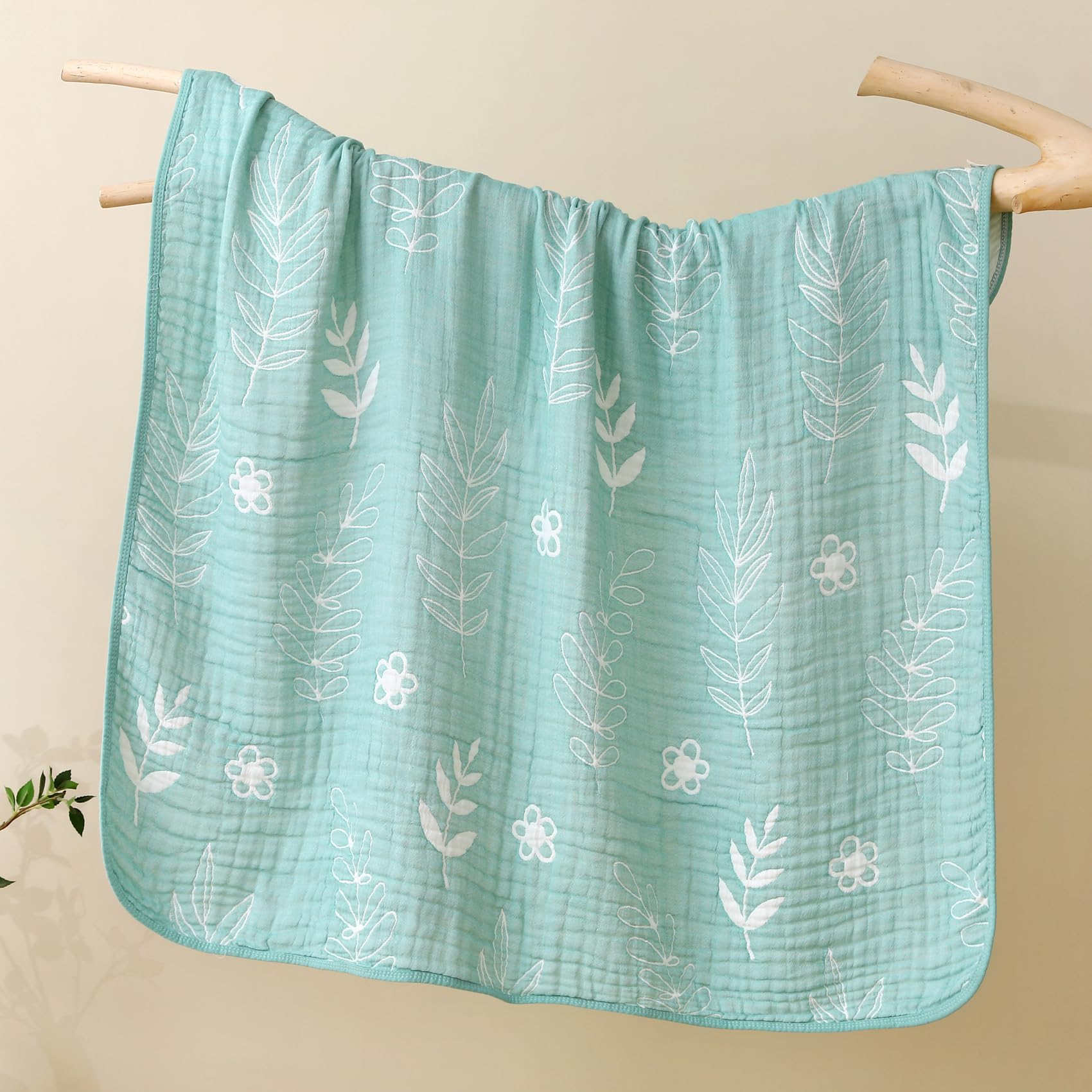 HardNok Muslin Blanket leaf-floral texture detail emphasizes natural design and gentle touch.