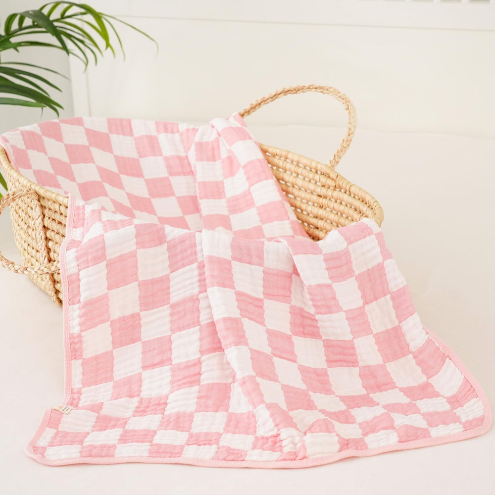 HardNok muslin blanket against baby's skin emphasizes softness and gentle touch
