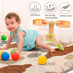 Harmon Wandyer baby play mat washable surface for quick cleanup after messes.