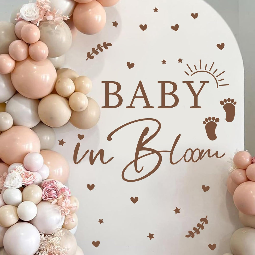 HATARU Baby in Bloom sign backdrop highlights festive baby shower decor.