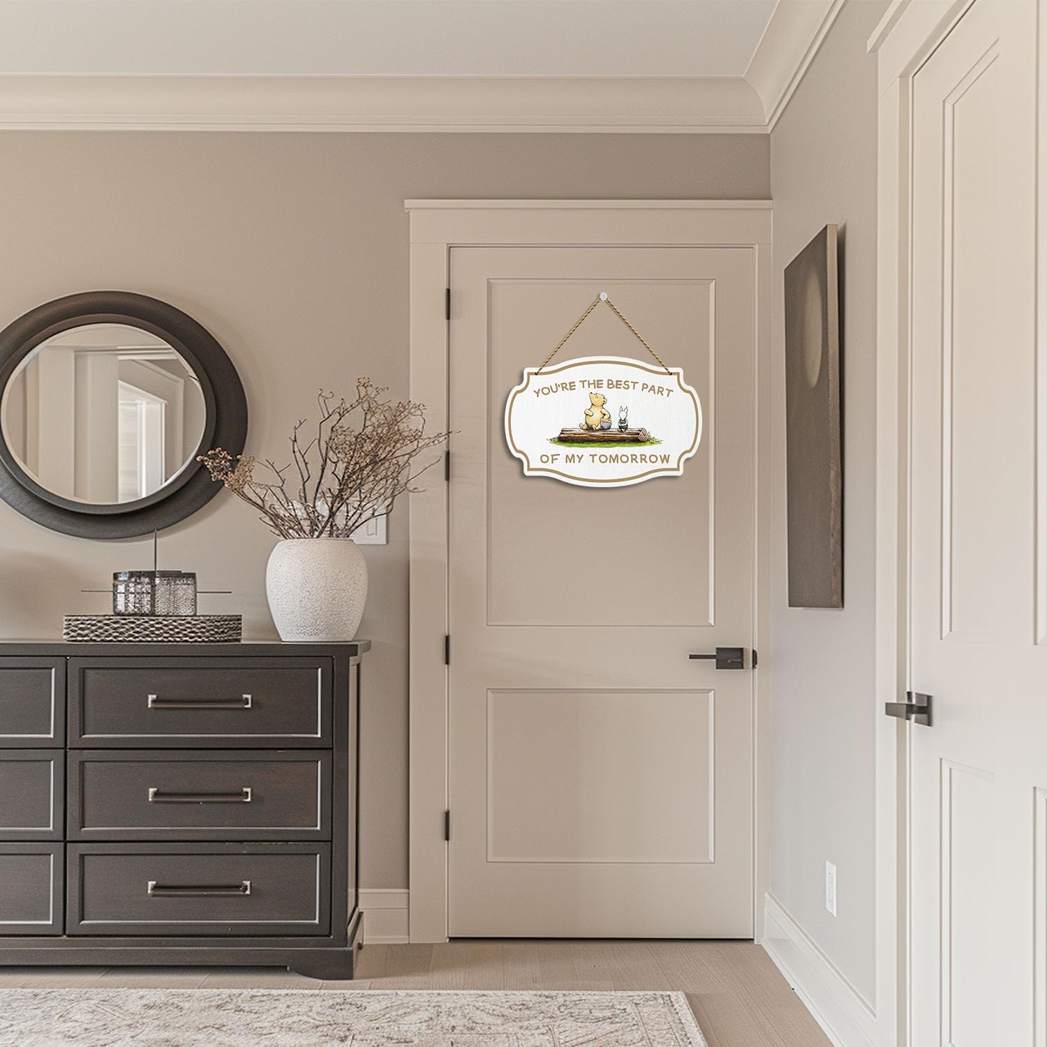 Hatzelou Winnie sign in nursery enhances soft, inviting space
