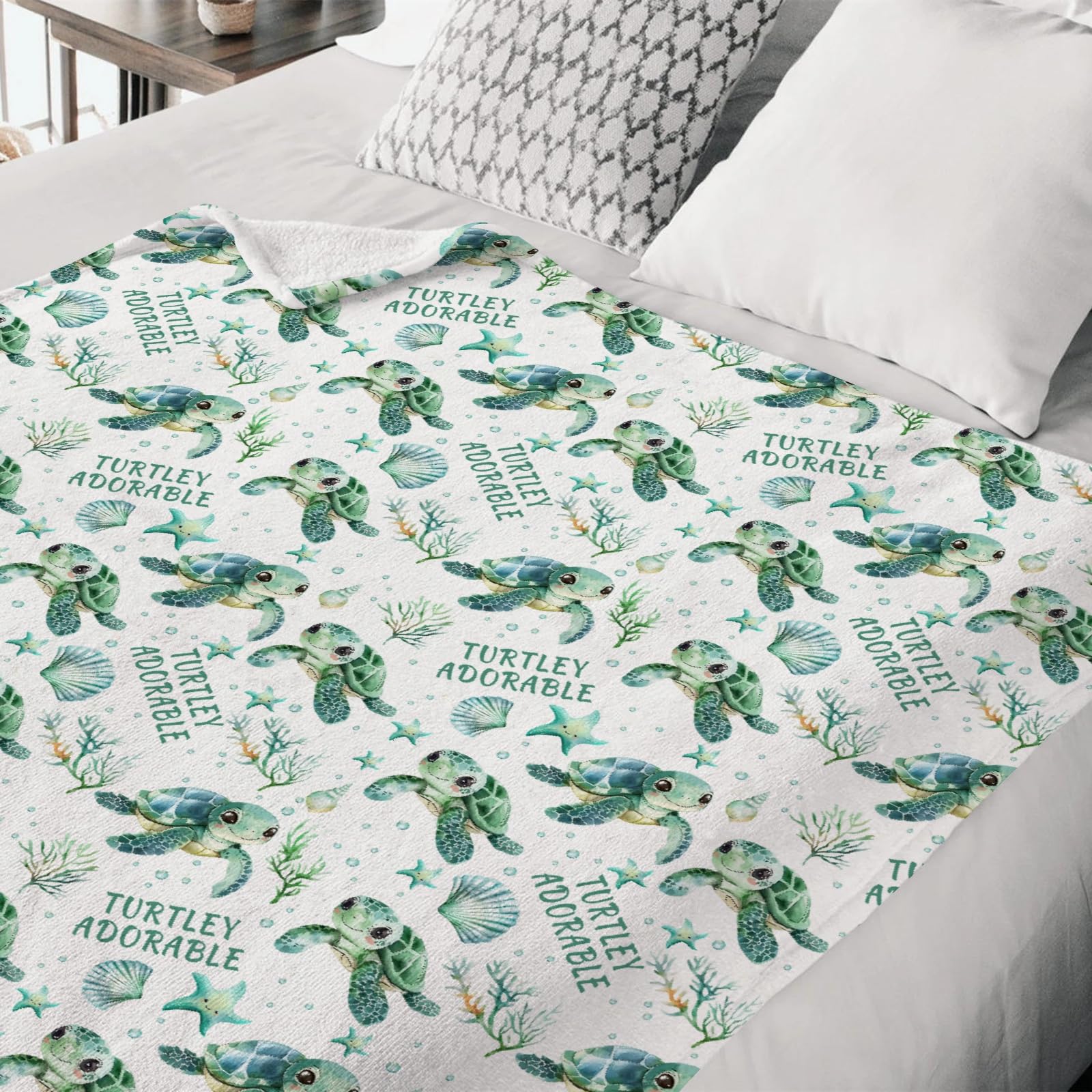 HawSkgFub turtle blanket demonstrates swaddle and nursing versatility