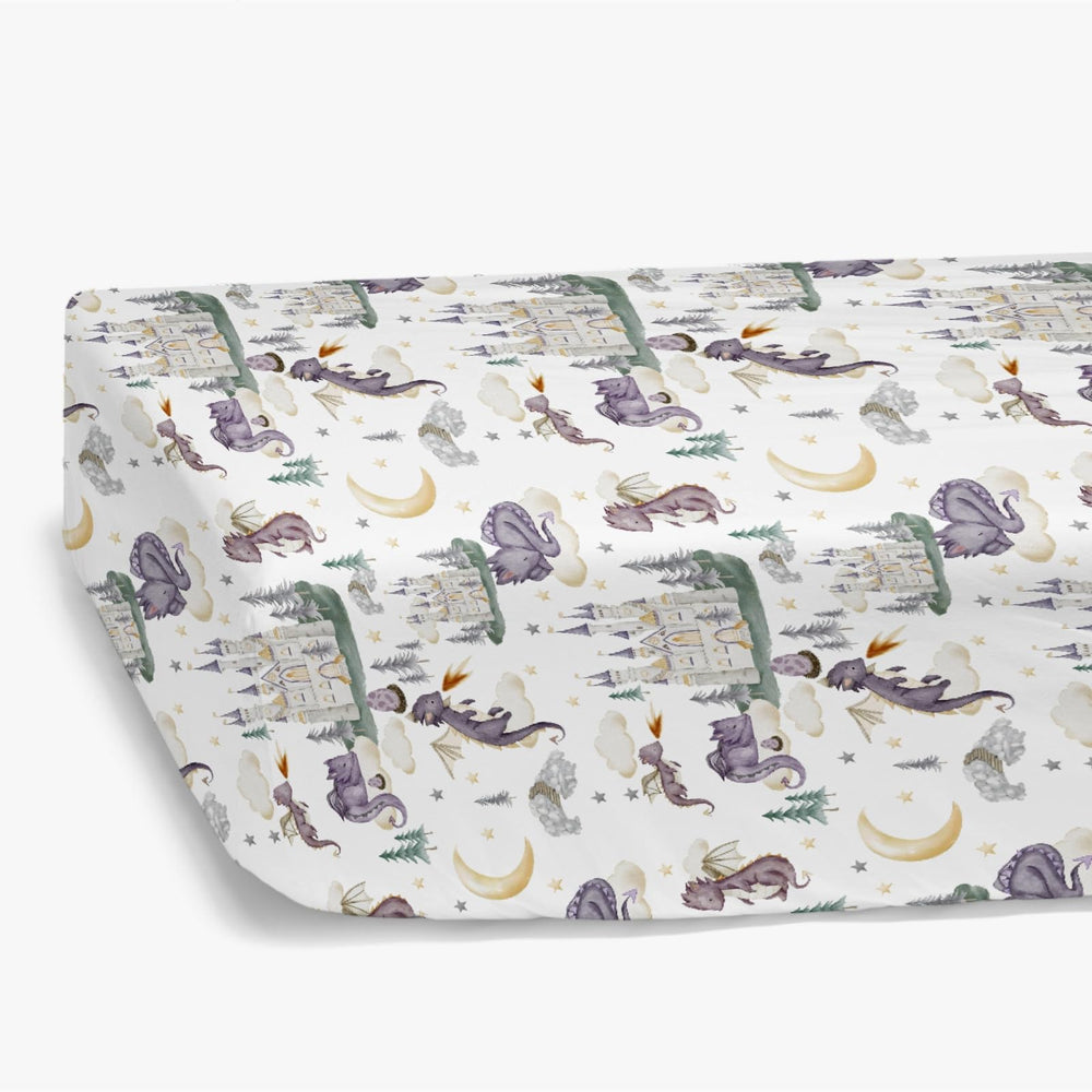 HawSkgFub purple-and-cloud motif creates cozy, inviting nursery space for restful sleep.