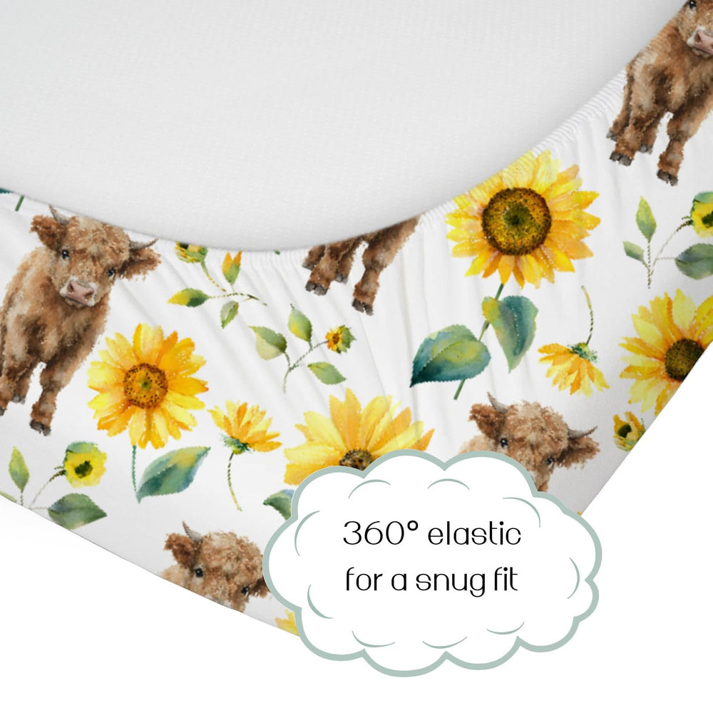 HawSkgFub Highland Cow Sunflower crib sheet closeup highlights soft, stretchy fabric.