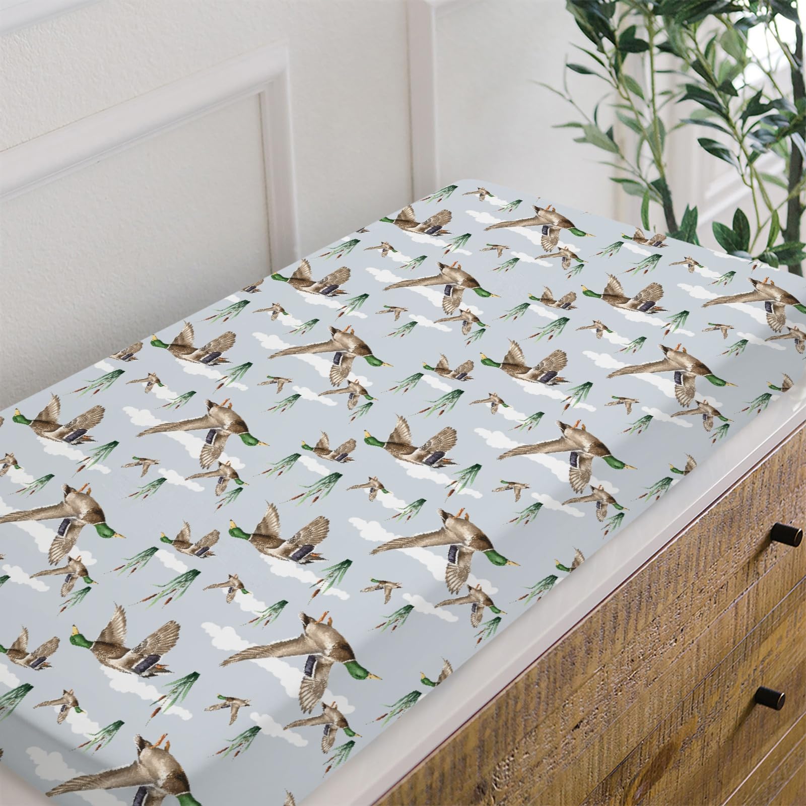 HawSkgFub machine-washable changing pad cover for easy care.