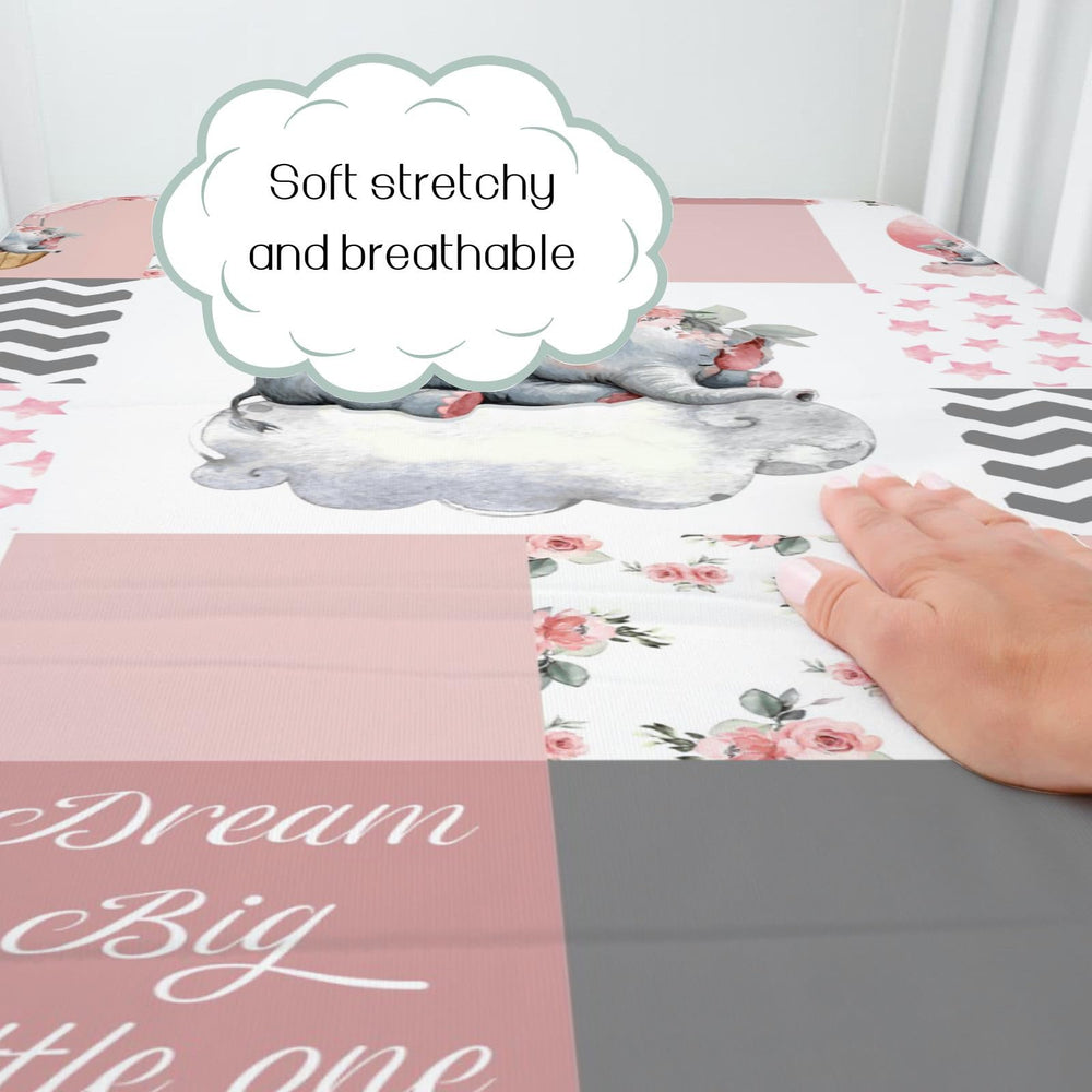 HawSkgFub patchwork crib sheet design on bed highlights dream big little one motif and nursery theme