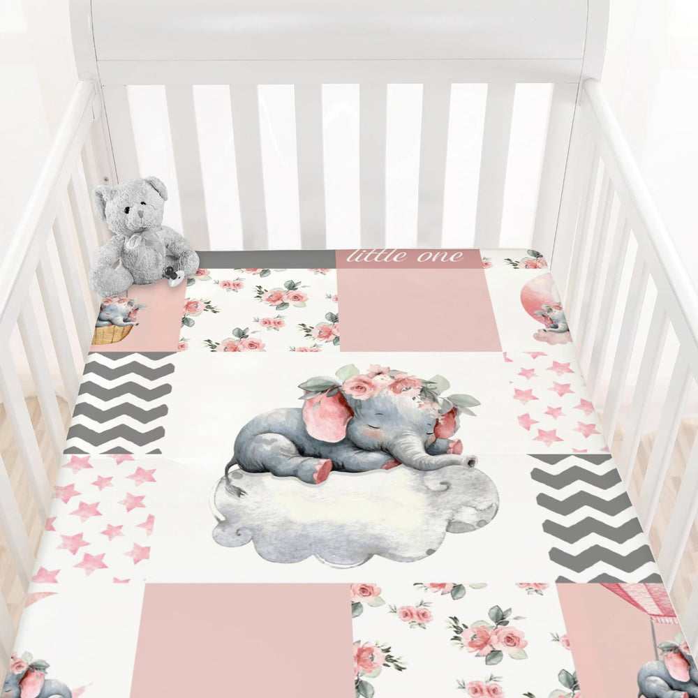 HawSkgFub pink elephant crib sheet closeup showing soft texture for gentle baby skin