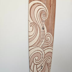 Headwaters Studio wooden surfboard made in USA provides durable wall decor.